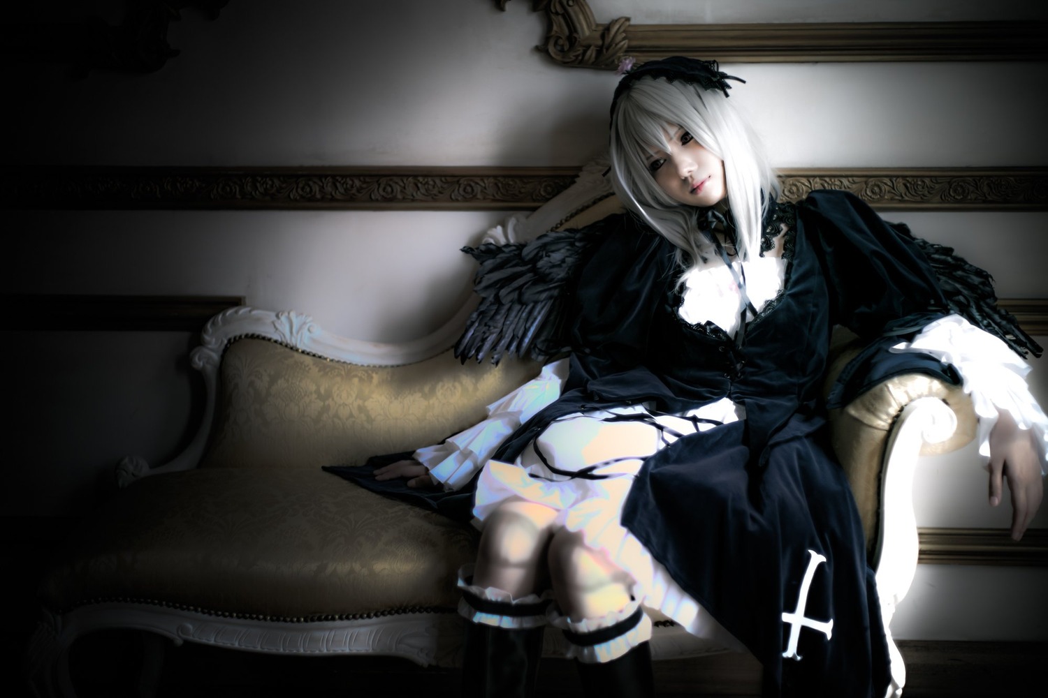 1girl breasts cleavage dress gothic_lolita lips lolita_fashion long_sleeves silver_hair sitting solo suigintou