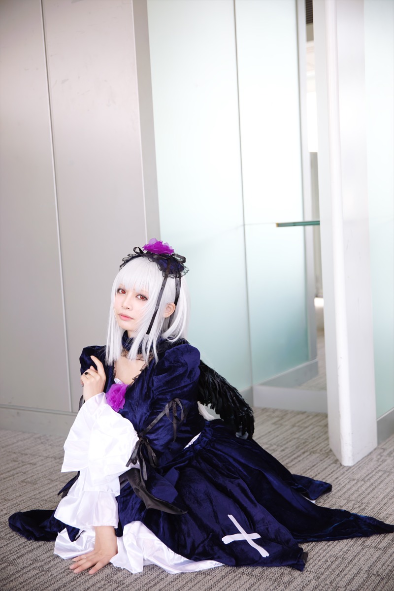 1girl bangs dress flower hairband indoors long_hair long_sleeves sitting solo suigintou