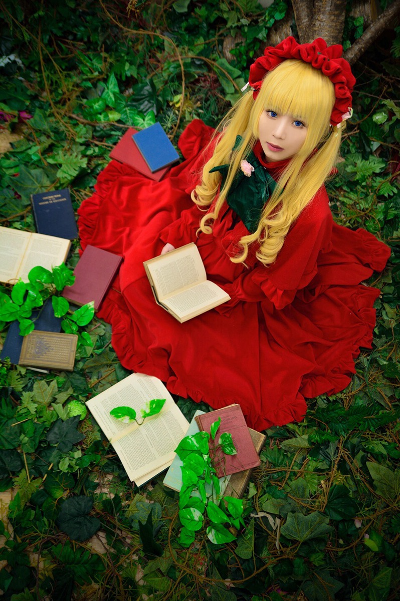 1girl blonde_hair blue_eyes book dress flower lips long_hair open_book plant red_dress rose shinku sitting solo