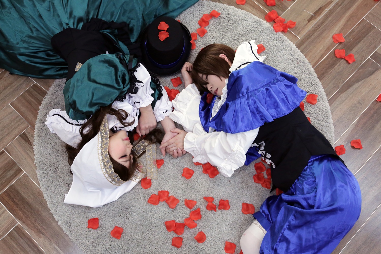 2girls blue_dress brown_hair closed_eyes dress flower frills hat long_sleeves lying multiple_cosplay multiple_girls on_side petals tagme