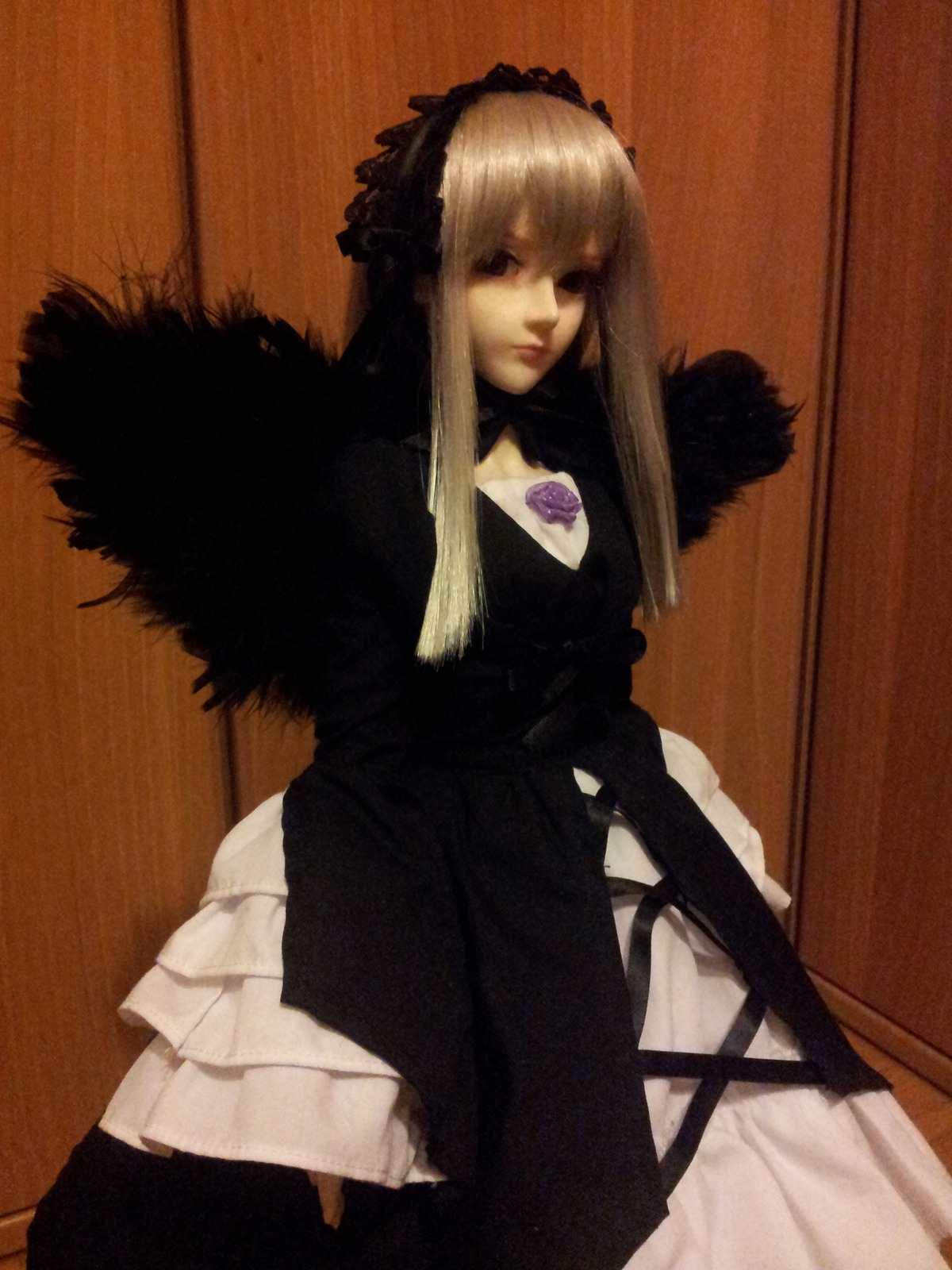 1girl bangs blonde_hair doll dress frills lips long_hair long_sleeves looking_at_viewer rose solo suigintou