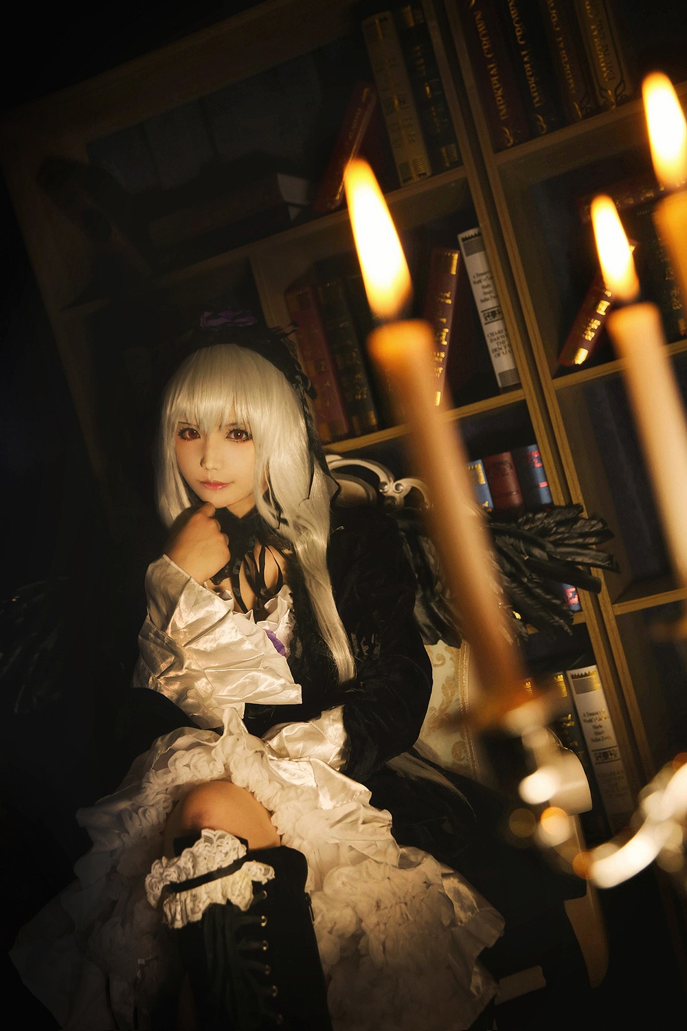 1girl bottle dress frills indoors lace lips long_hair sitting solo suigintou