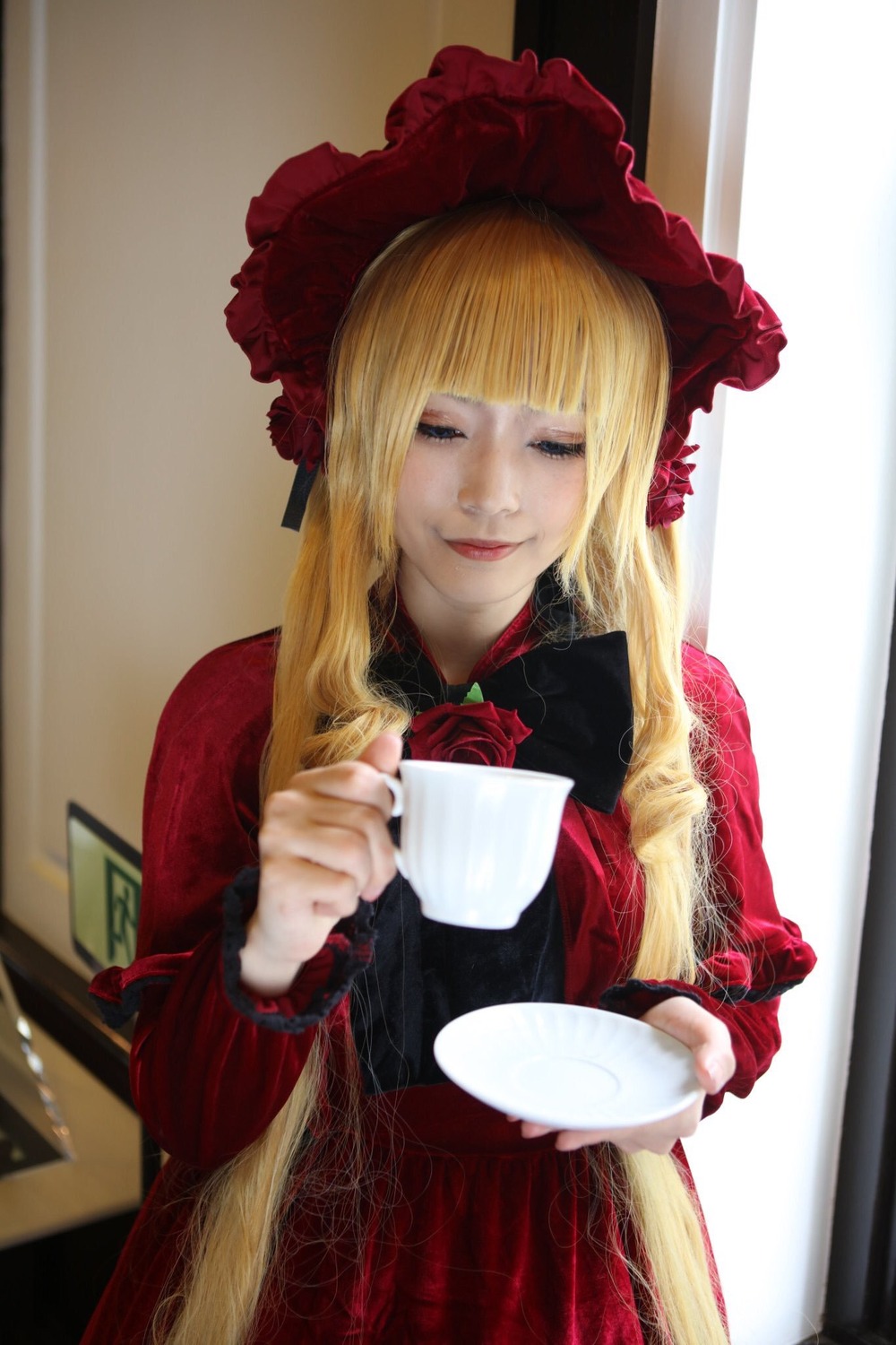 1girl bangs blonde_hair bonnet closed_eyes cup flower lips long_hair realistic rose saucer shinku sitting solo teacup