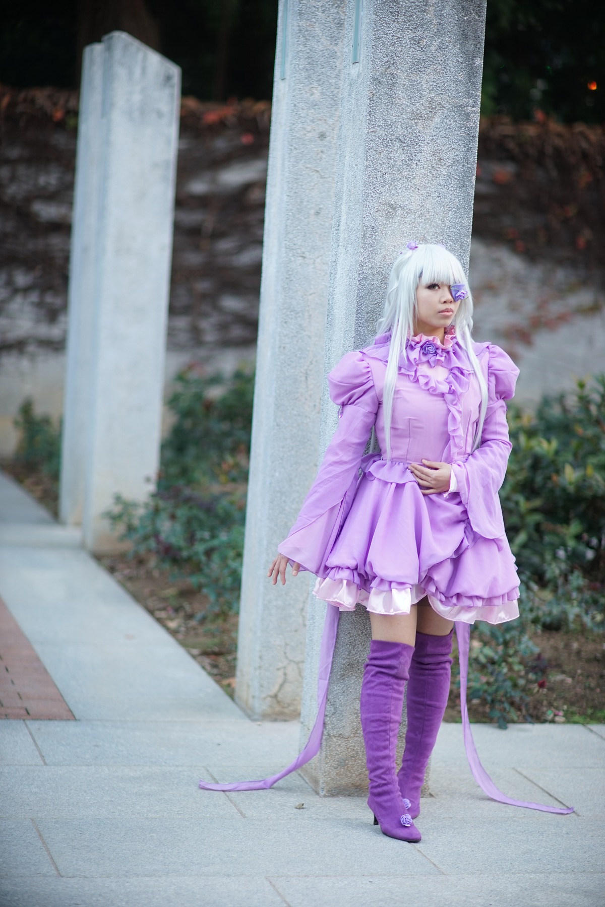 1girl barasuishou blurry blurry_background boots depth_of_field dress full_body hair_ornament long_hair long_sleeves outdoors photo_background purple_dress purple_eyes purple_legwear solo standing thighhighs zettai_ryouiki