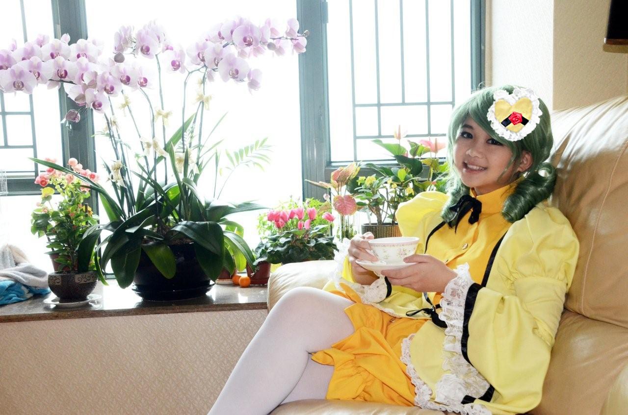 1girl black_hair couch dress flower indoors kanaria plant potted_plant sitting solo window yellow_dress