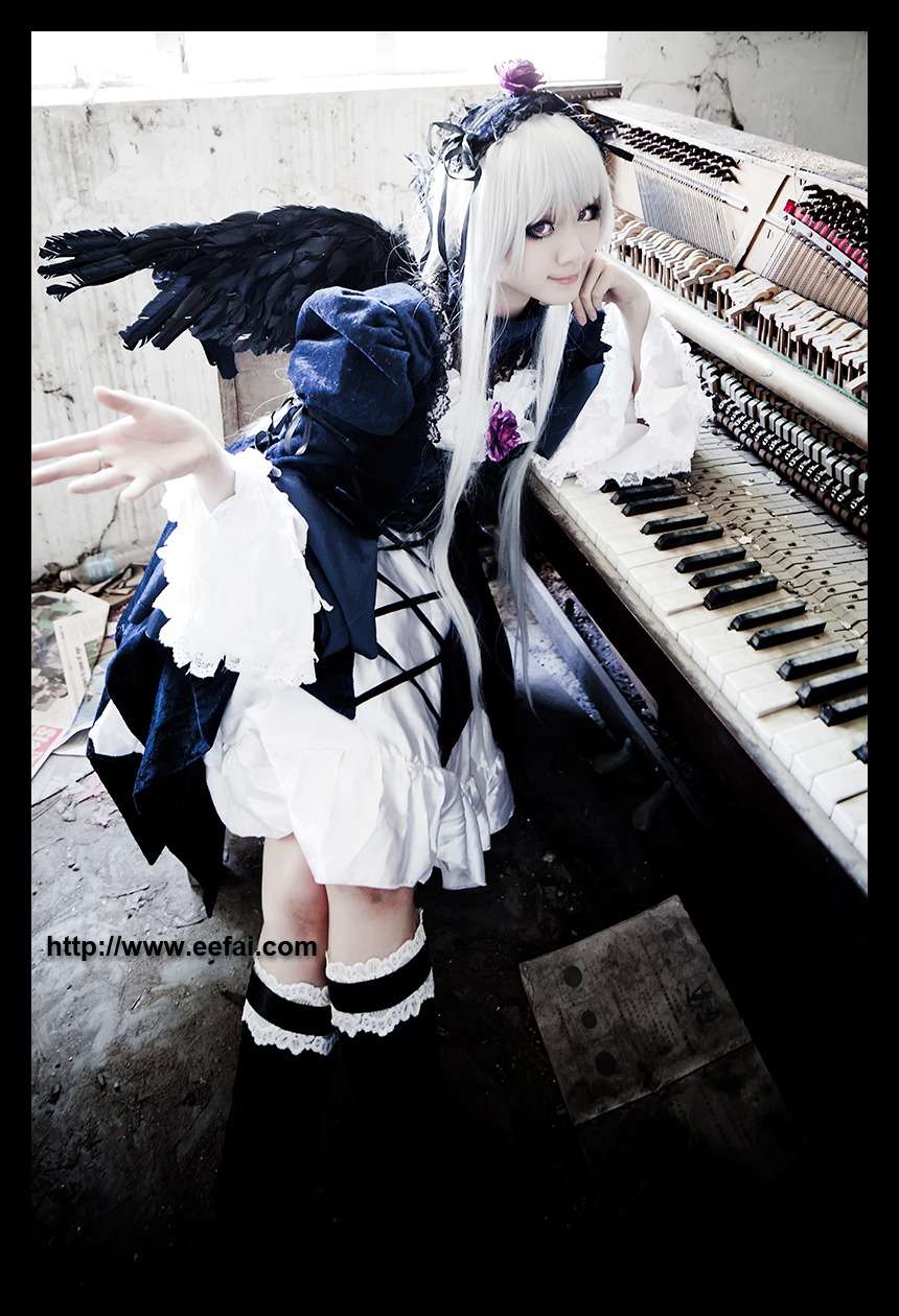 1girl black_border black_wings dress feathers frills instrument letterboxed long_hair pillarboxed silver_hair solo suigintou wings