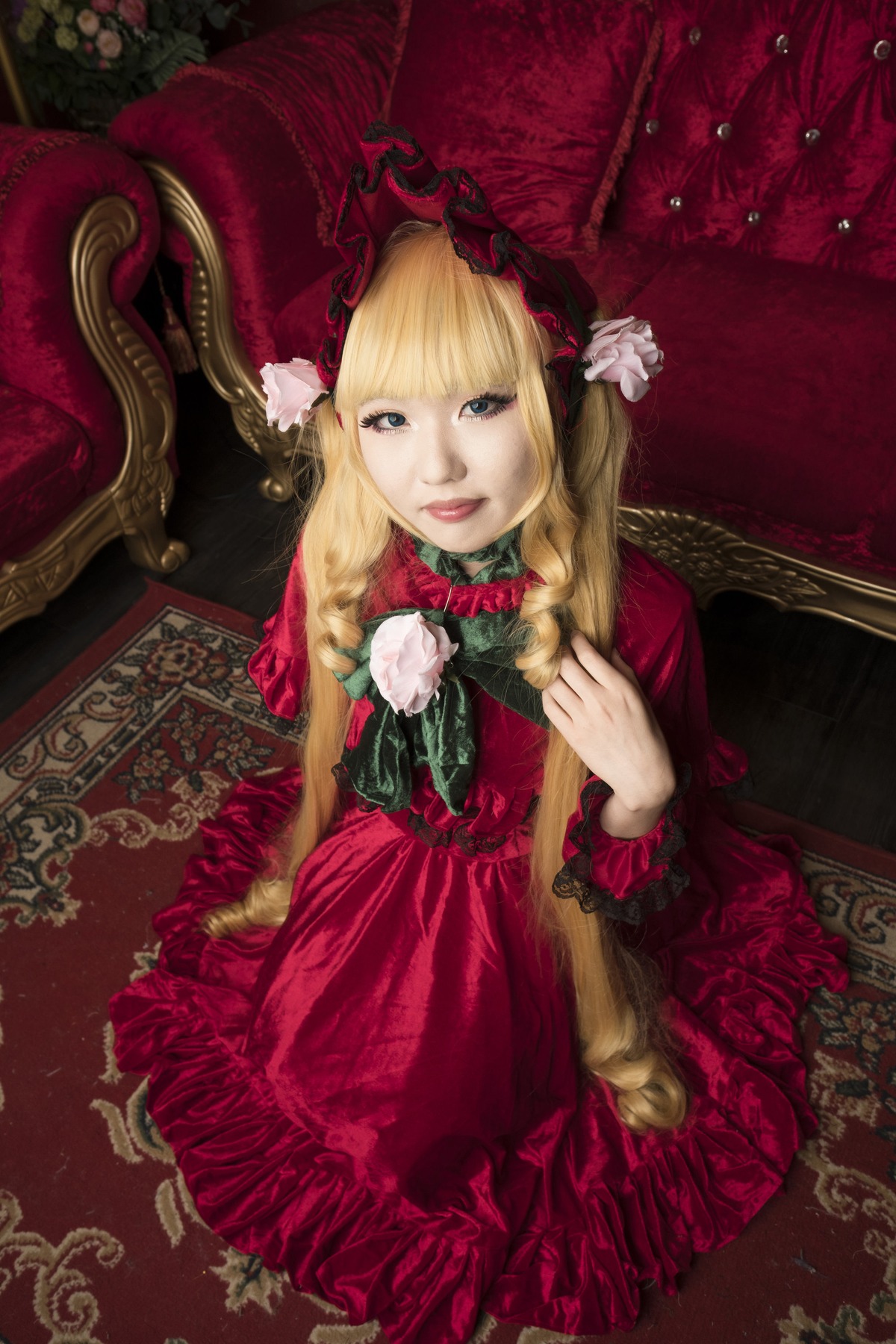 1girl blonde_hair blue_eyes dress flower frills lips lolita_fashion long_hair looking_at_viewer red_dress red_theme rose shinku sitting solo