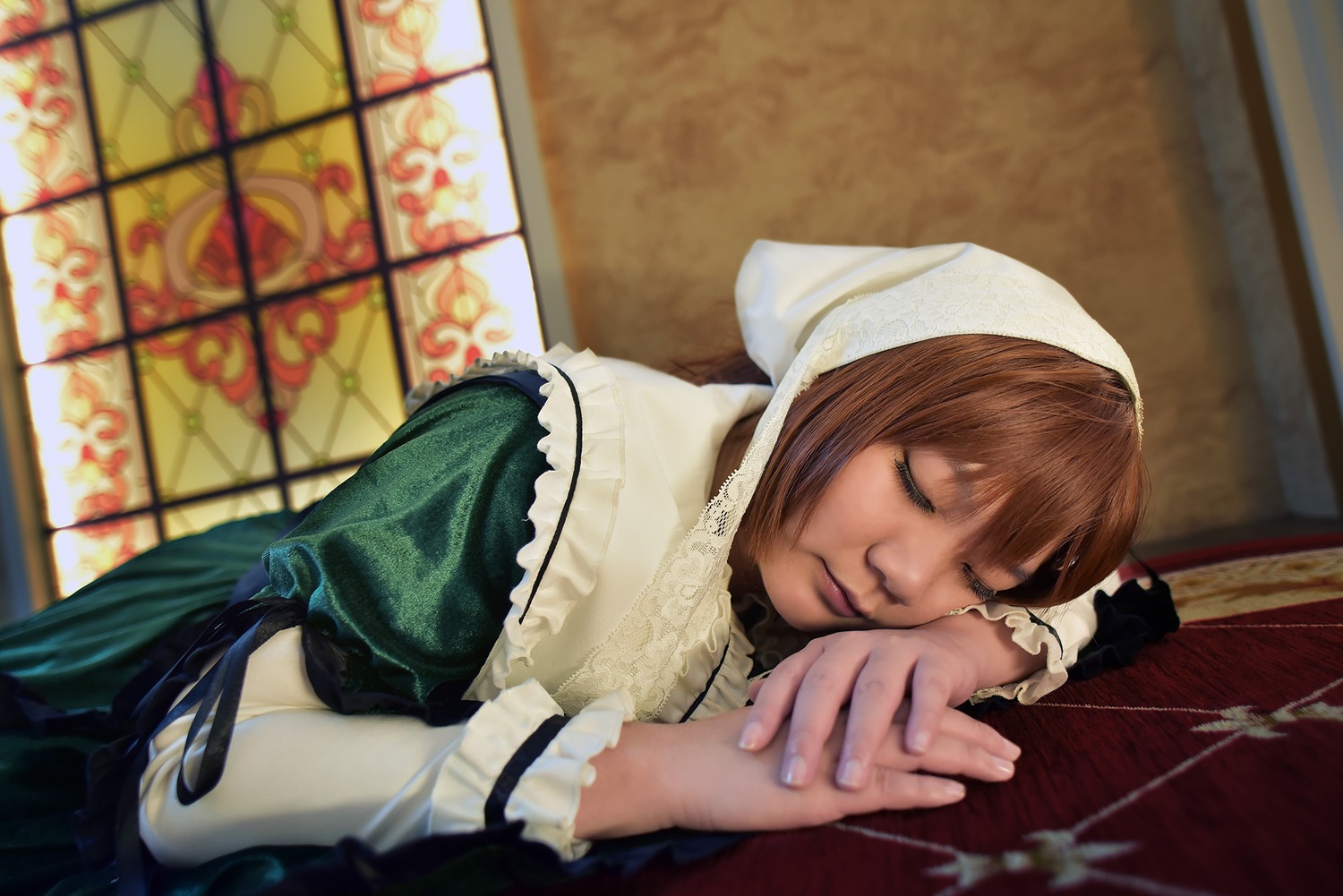 1girl blurry brown_hair closed_eyes dress gloves green_dress indoors lying short_hair solo suiseiseki