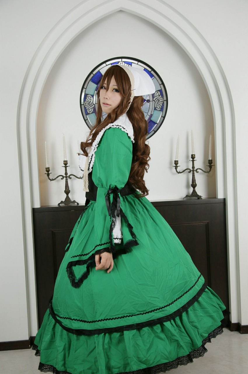 1girl brown_hair dress frills green_dress green_eyes long_hair long_sleeves looking_at_viewer solo suiseiseki