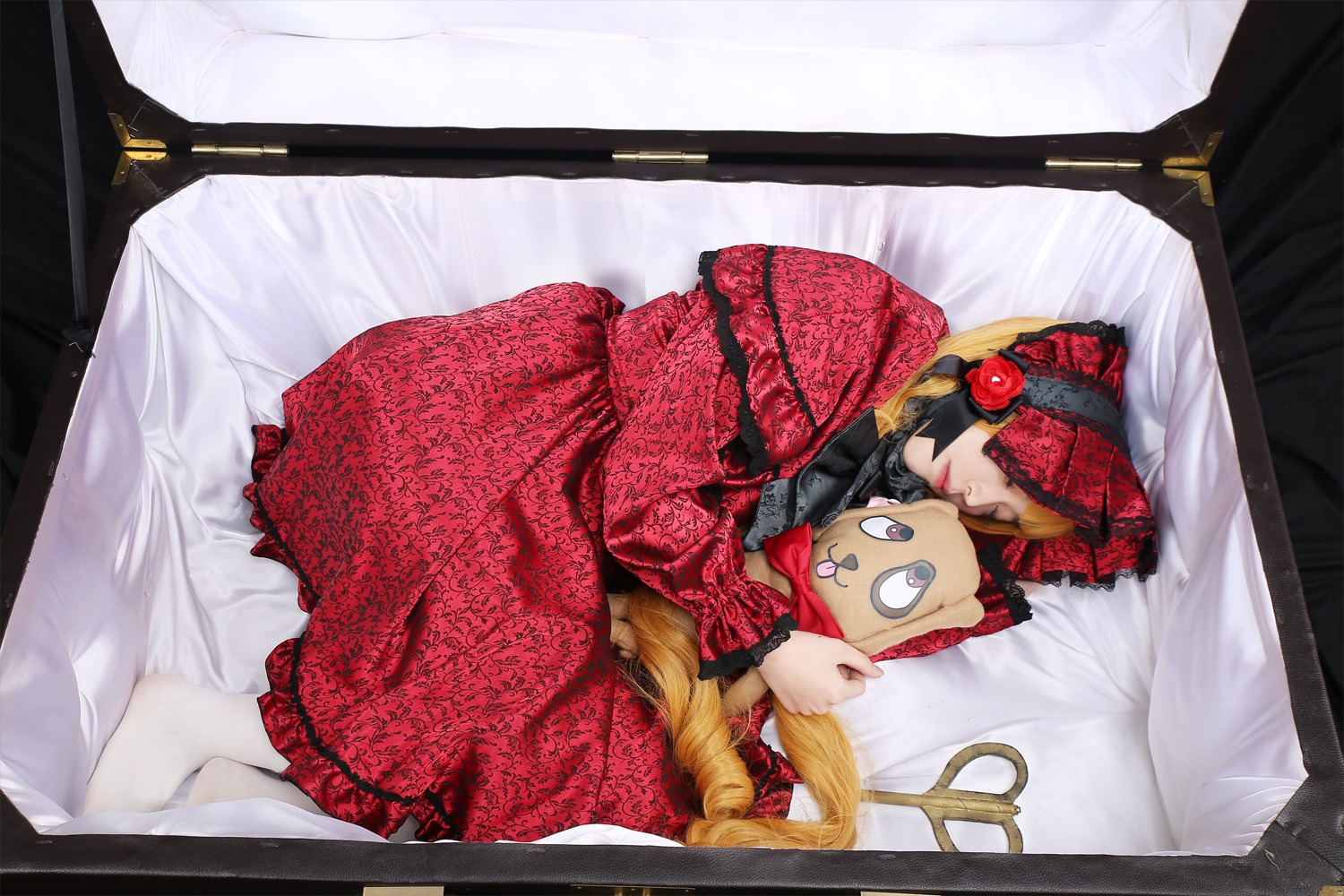 1girl bed doll dress frills pillow shinku solo stuffed_animal