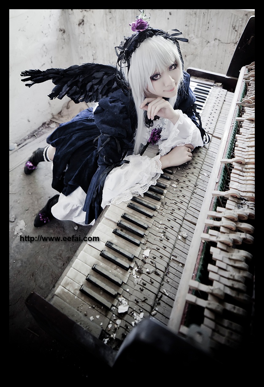 1girl auto_tagged black_wings dress feathers flower frills hairband instrument letterboxed long_hair silver_hair solo suigintou wings