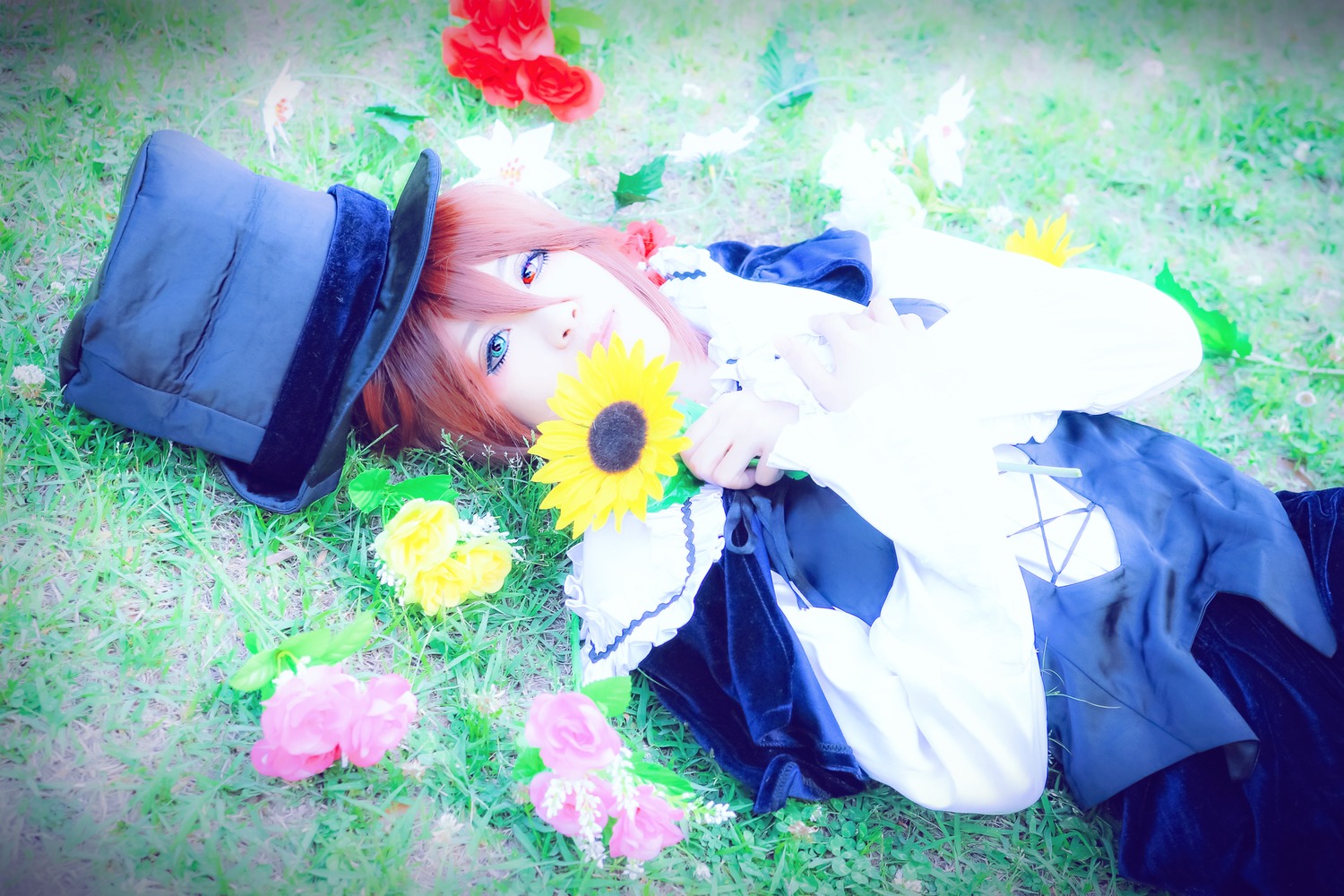 1boy blue_eyes flower grass hat lying red_hair solo souseiseki sunflower top_hat