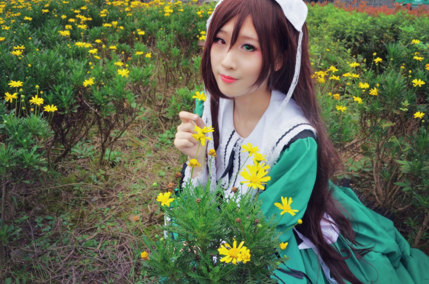 1girl brown_hair bug day flower green_eyes head_scarf insect lips long_hair nature outdoors solo suiseiseki