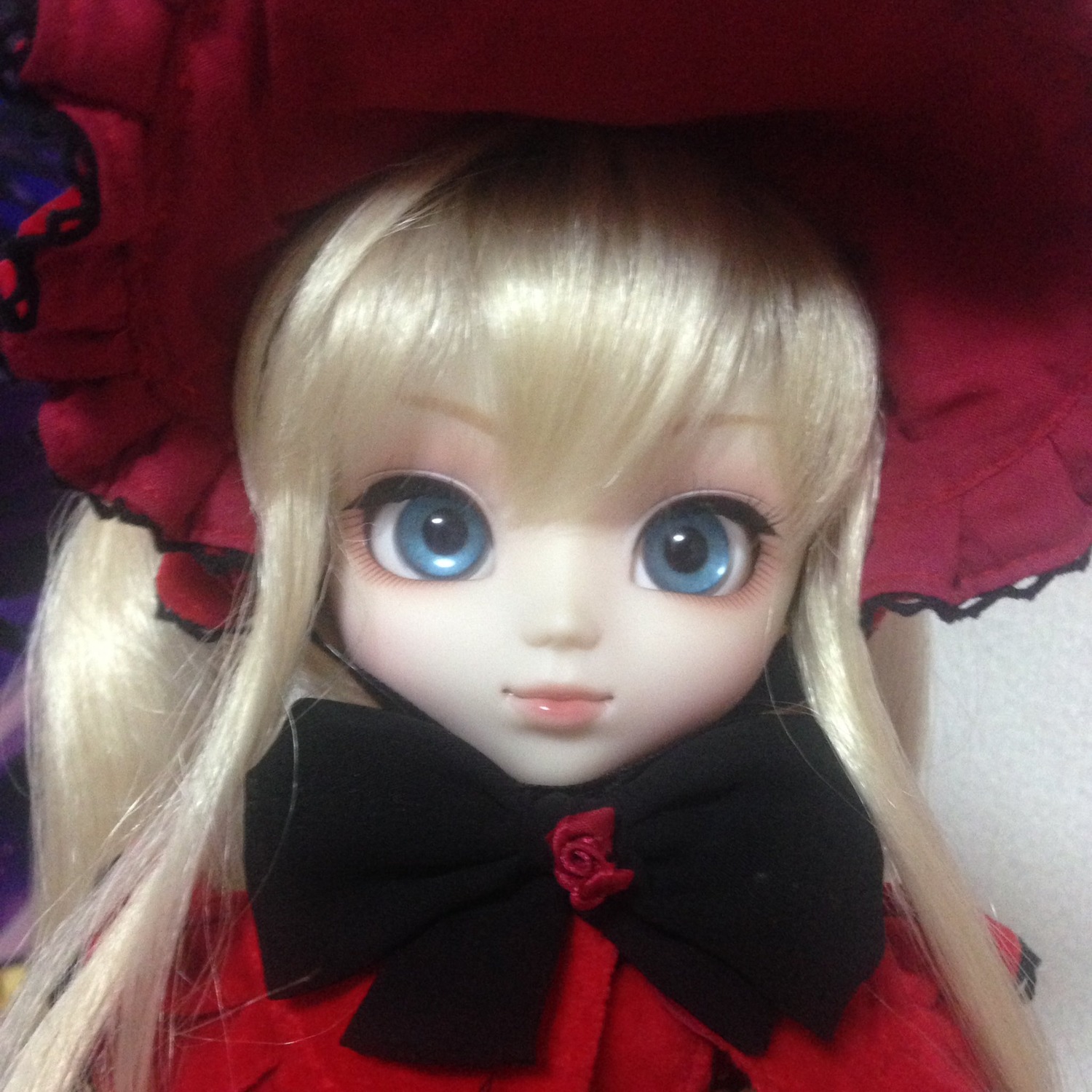 1girl bangs blonde_hair blue_eyes bonnet bow closed_mouth doll eyelashes face flower hat lips long_hair looking_at_viewer portrait red_rose rose shinku solo