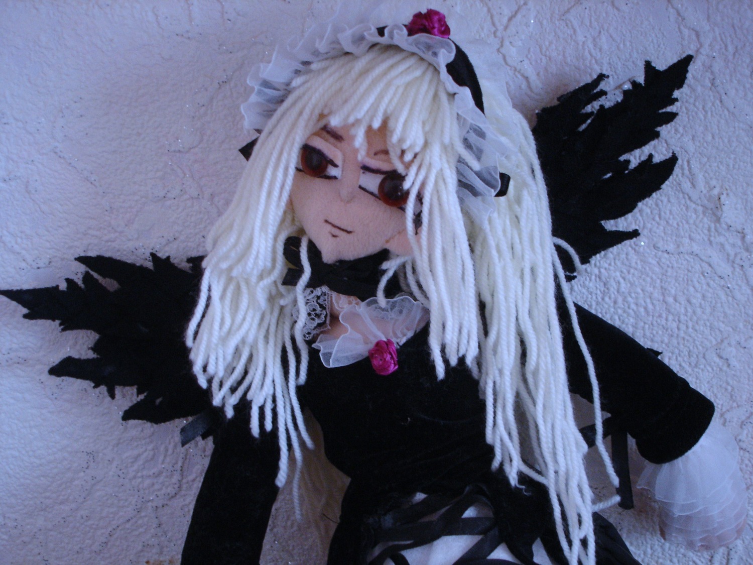 1girl bangs black_dress doll dress frills gothic_lolita lolita_fashion long_hair red_eyes rose solo suigintou upper_body white_hair