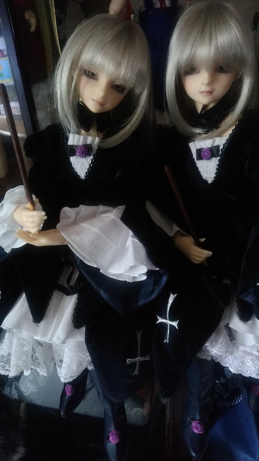 2girls apron bangs doll dress frills long_sleeves multiple_girls sisters solo standing suigintou twins