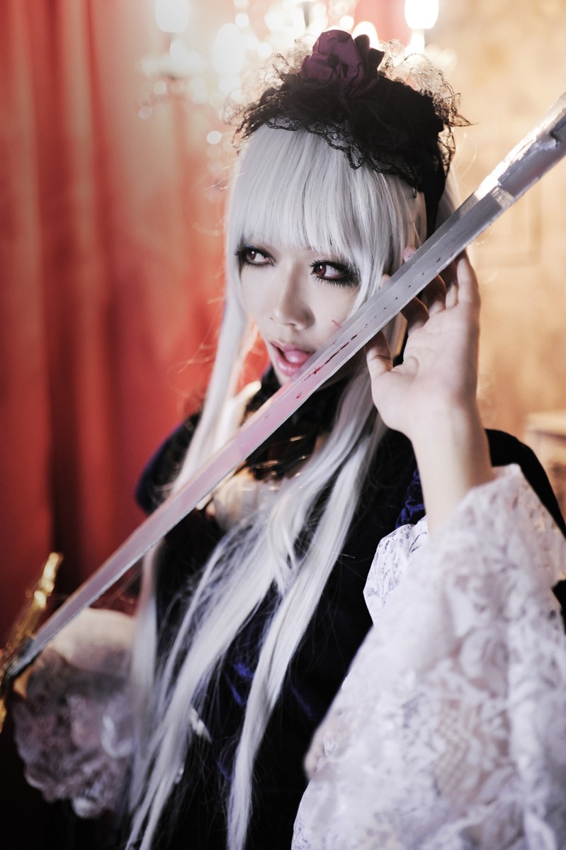 1girl bangs blunt_bangs blurry blurry_background curtains depth_of_field frills gothic_lolita holding lips lolita_fashion long_hair long_sleeves looking_at_viewer solo suigintou sword upper_body weapon